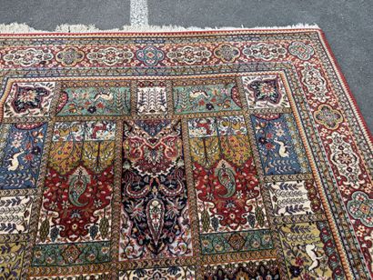 Large, multicolored machine-woven rug featuring...
