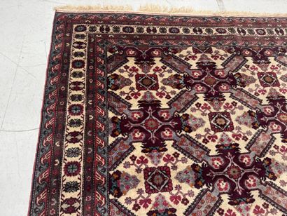 IRAN.
Hand-knotted wool rug with stylized...