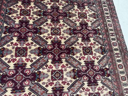 IRAN.
Hand-knotted wool rug with stylized...