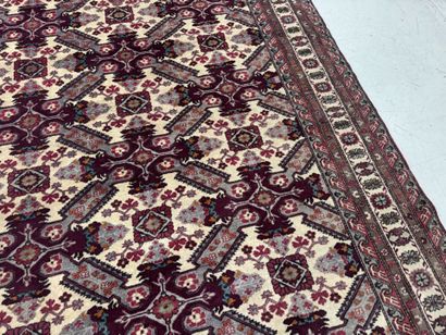 IRAN.
Hand-knotted wool rug with stylized...