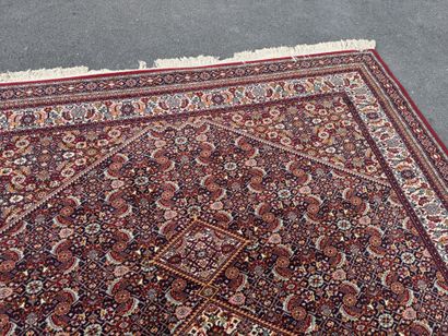 Large machine-woven rug made of multicolored...