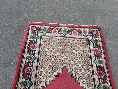 Hand-knotted wool gallery rug with a decorative...