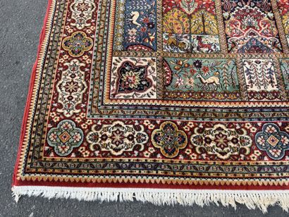 Large, multicolored machine-woven rug featuring...