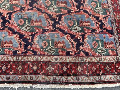 Hand-knotted wool rug with a landscape design.
158...