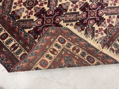 IRAN.
Hand-knotted wool rug with stylized...