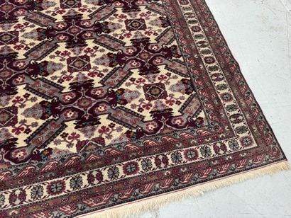 IRAN.
Hand-knotted wool rug with stylized...