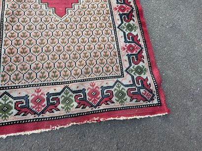 Hand-knotted wool gallery rug with a decorative...