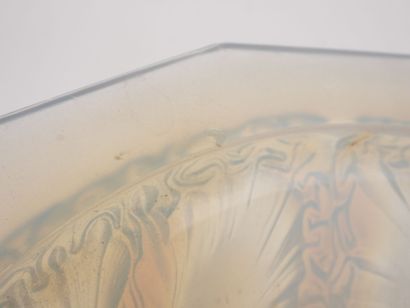 Circular, beveled-edged bowl made of milky...