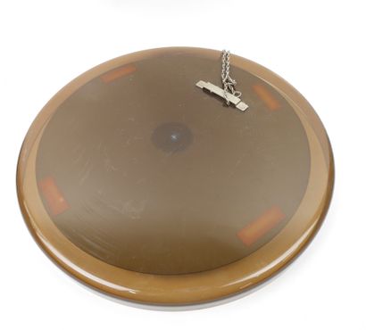 Miroir circulaire en plastique marron.
Travail...
