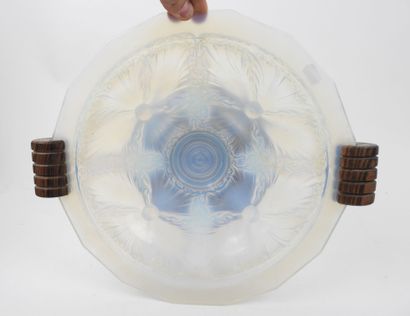 Circular, beveled-edged bowl made of milky...