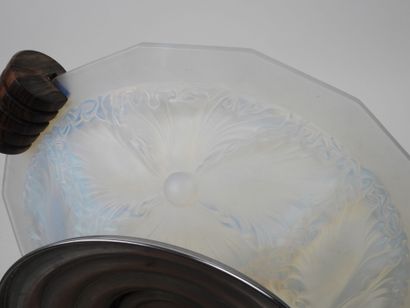 Circular, beveled-edged bowl made of milky...