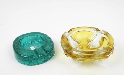 Two ashtrays made of yellow and green tinted...