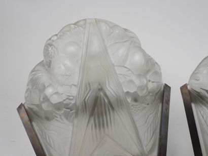Pair of molded glass wall sconces with a...
