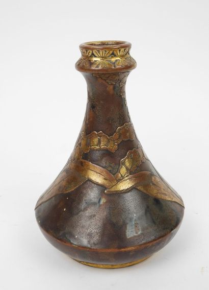 Porcelain vase with a flattened body, featuring...