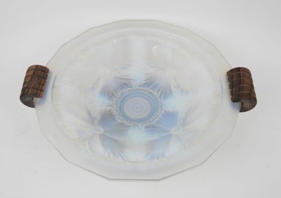 Circular, beveled-edged bowl made of milky...