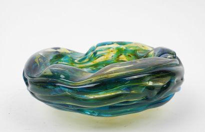 Circular ashtray made of blue- and yellow-tinted...