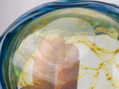 Circular ashtray made of blue- and yellow-tinted...