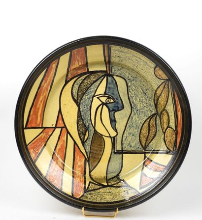 Grande coupe circulaire en céramique polychrome...