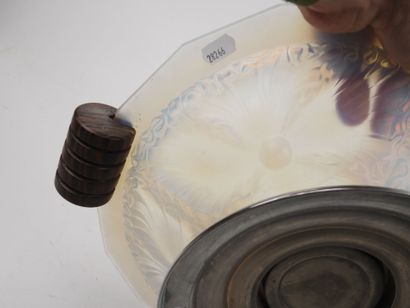 Circular, beveled-edged bowl made of milky...