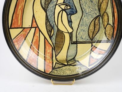 Grande coupe circulaire en céramique polychrome...