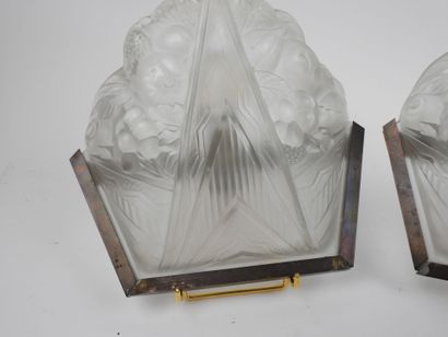 Pair of molded glass wall sconces with a...
