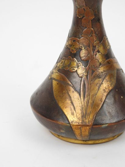 Porcelain vase with a flattened body, featuring...