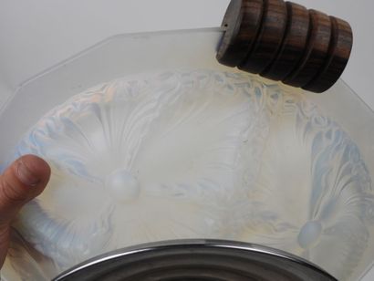 Circular, beveled-edged bowl made of milky...