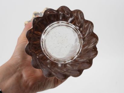 Vase with wavy edges and twisted ribs, made...