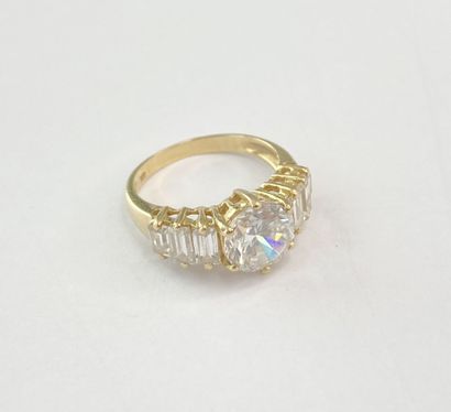 Gold ring with white stones** (round and...