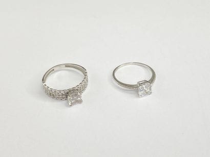 2 white gold rings with stones**, size 53,...