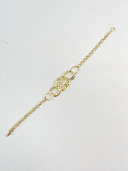 Gold bracelet with design and butterfly,...