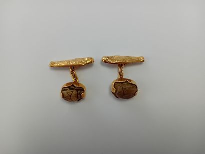 Pair of gold cufflinks with gemstones** AC...