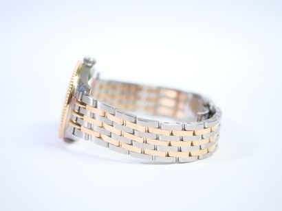 BREITLING. 
Montre-bracelet en acier et or...