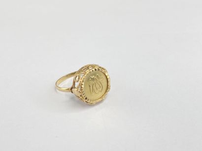 Gold ring with foreign inscription, size...