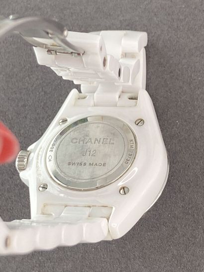 CHANEL J.12 Model, white ceramic, 33 cm diameter....