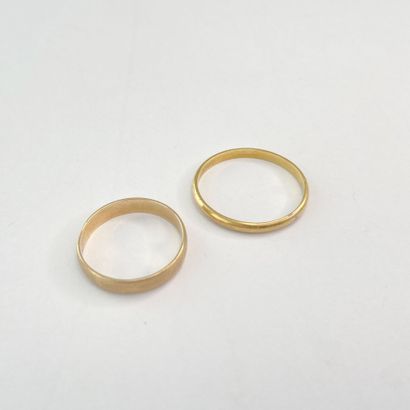 2 gold wedding rings, sizes 55 and 66, 4.79...