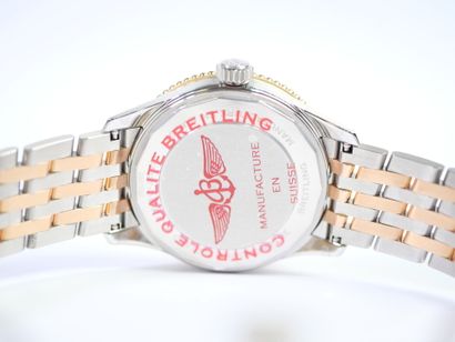 BREITLING. 
Montre-bracelet en acier et or...