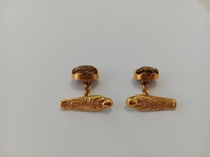 Pair of gold cufflinks with gemstones** AC...