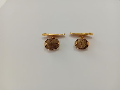 Pair of gold cufflinks with gemstones** AC...