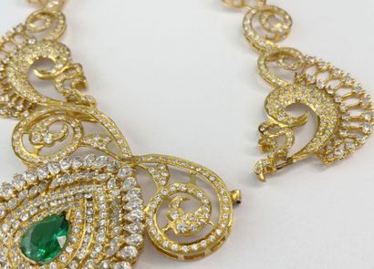 Broken necklace with metal ring and a pair...