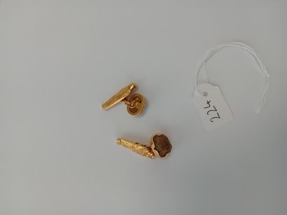 Pair of gold cufflinks with gemstones** AC...
