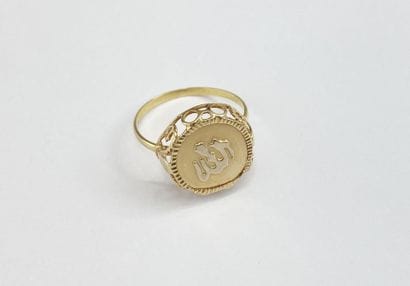 Gold ring with foreign inscription, size...