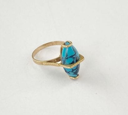 Bague or pierre** bleue ovale dgt 49 C 3,22...