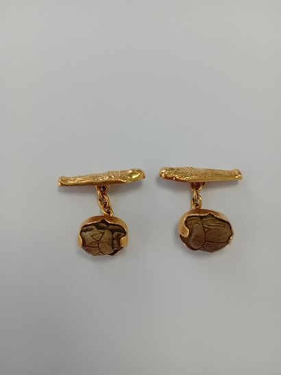 Pair of gold cufflinks with gemstones** AC...