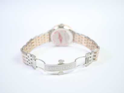 BREITLING. 
Montre-bracelet en acier et or...