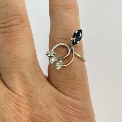 Bague serpent or pierres** dont une bleue...