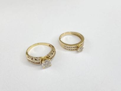 2 gold rings with gemstones**, size 54, 6.46...