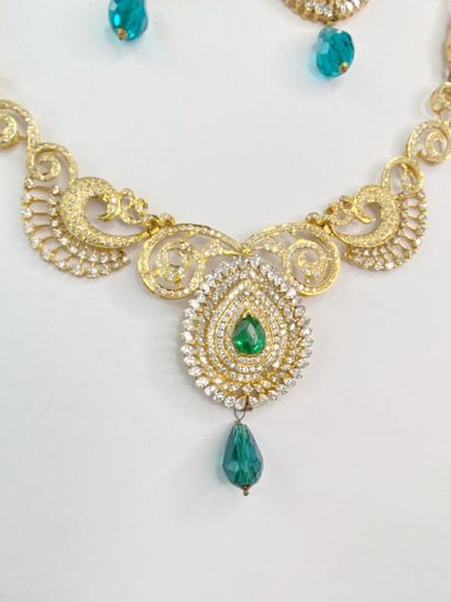 Broken necklace with metal ring and a pair...
