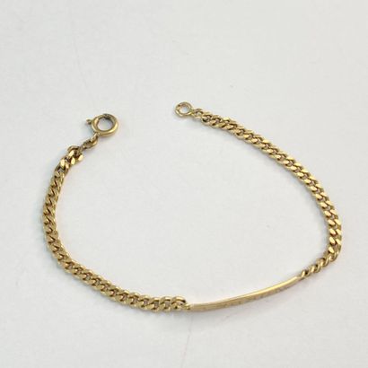 Bracelet d'identité or avec inscription (cassé)...