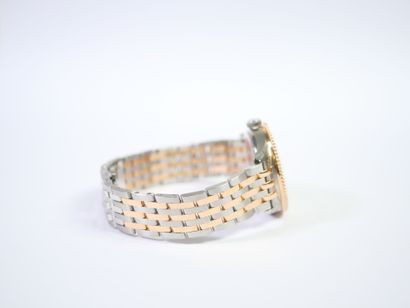 BREITLING. 
Montre-bracelet en acier et or...
